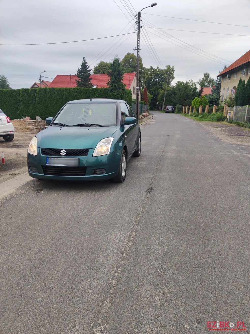 2006' Suzuki Swift photo #5