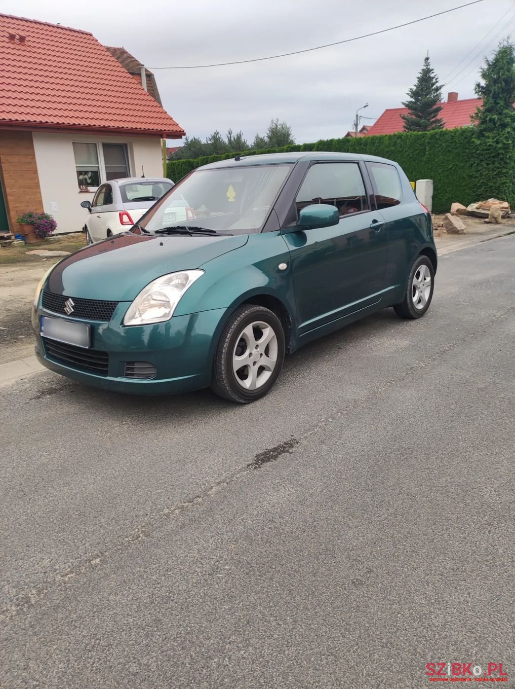 2006' Suzuki Swift photo #4