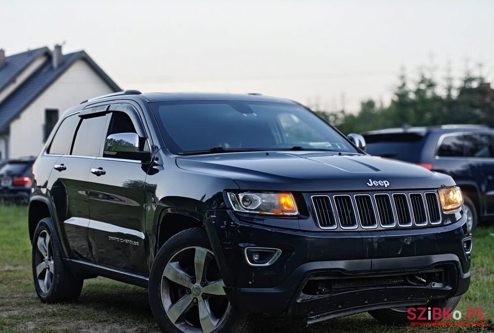 2014' Jeep Grand Cherokee photo #5