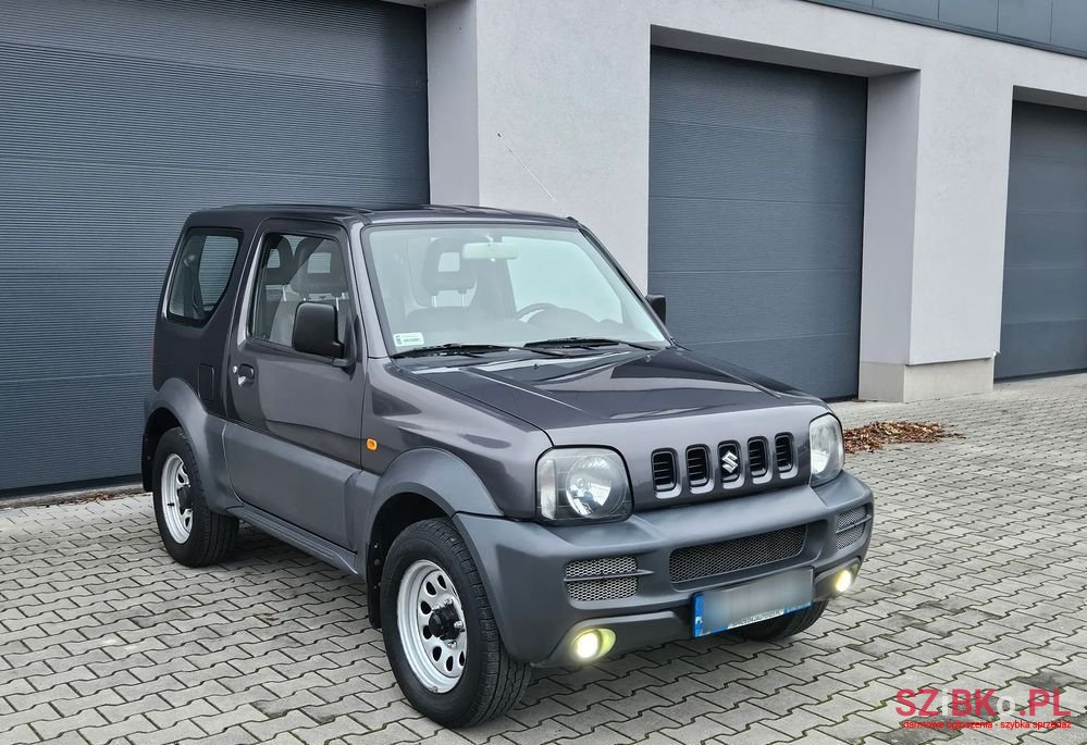 2011' Suzuki Jimny 1.3 Club Eu5 photo #1