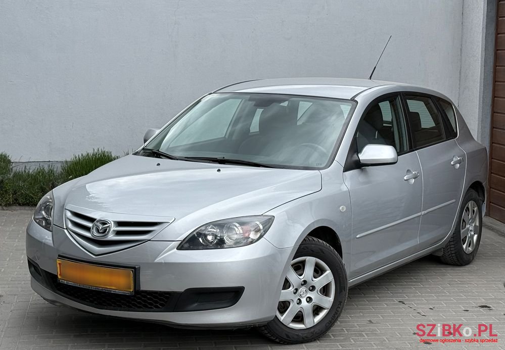 2009' Mazda 3 1.4 Comfort photo #1