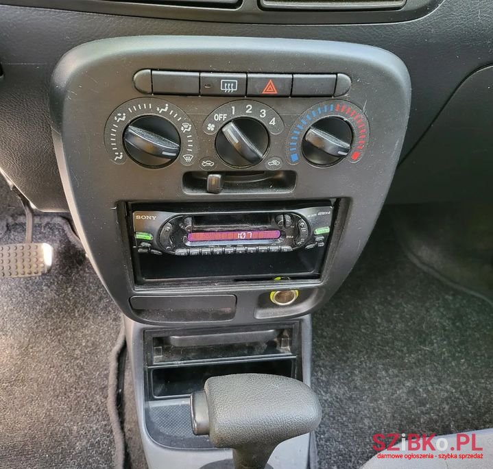 2003' Daihatsu Cuore photo #4