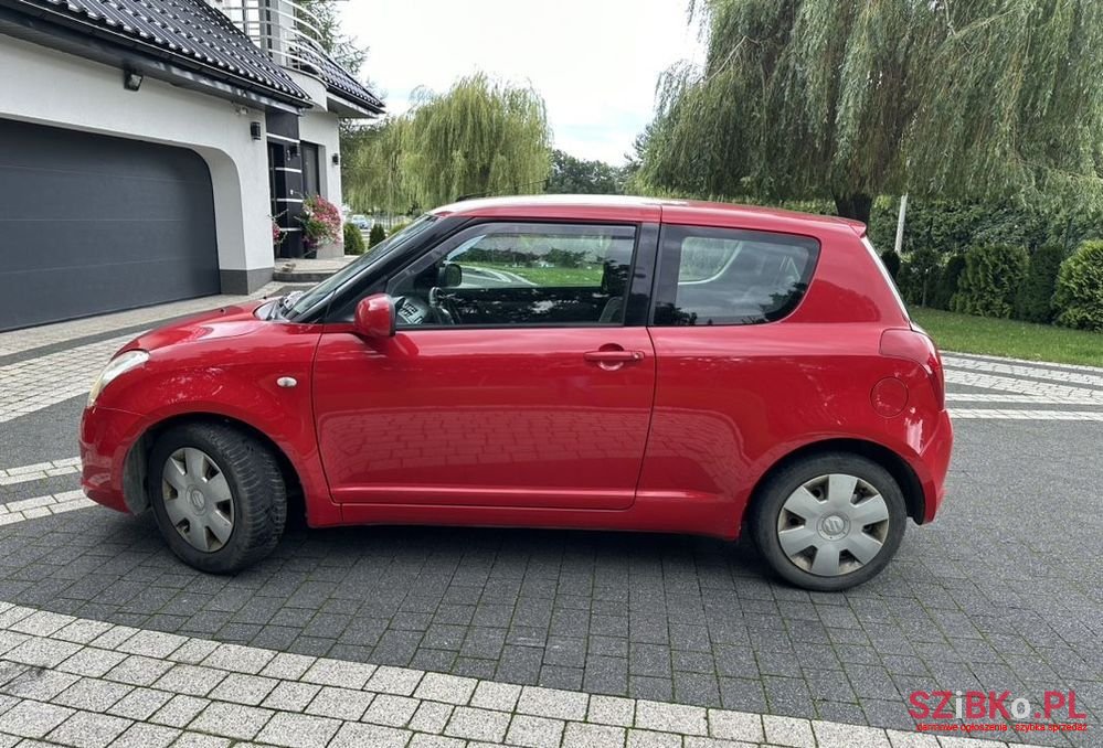2007' Suzuki Swift 1.3 Sakura photo #3