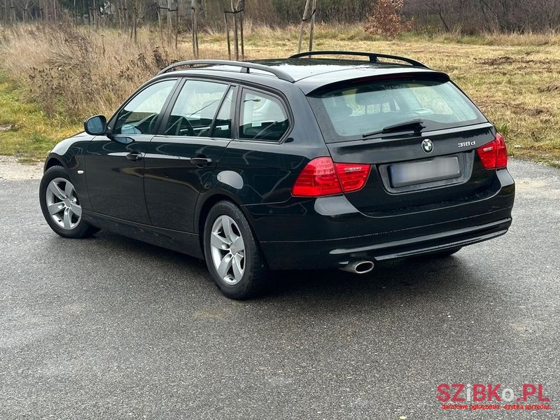 2009' BMW 3 Series 318D photo #5