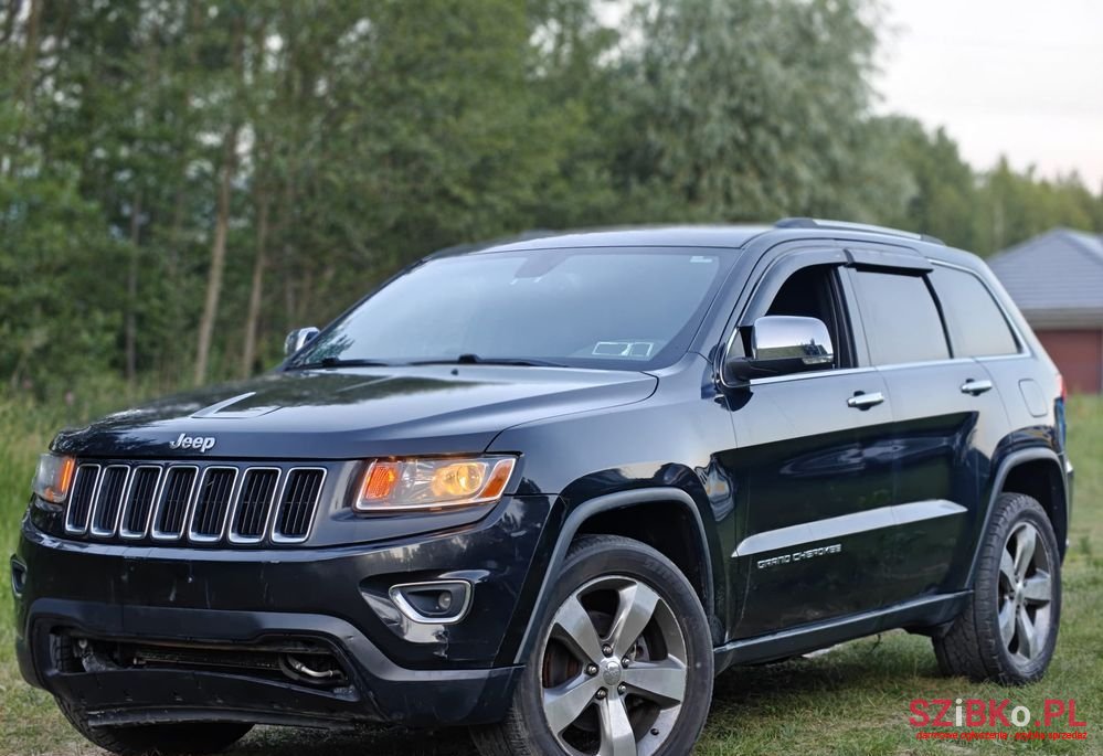 2014' Jeep Grand Cherokee photo #2