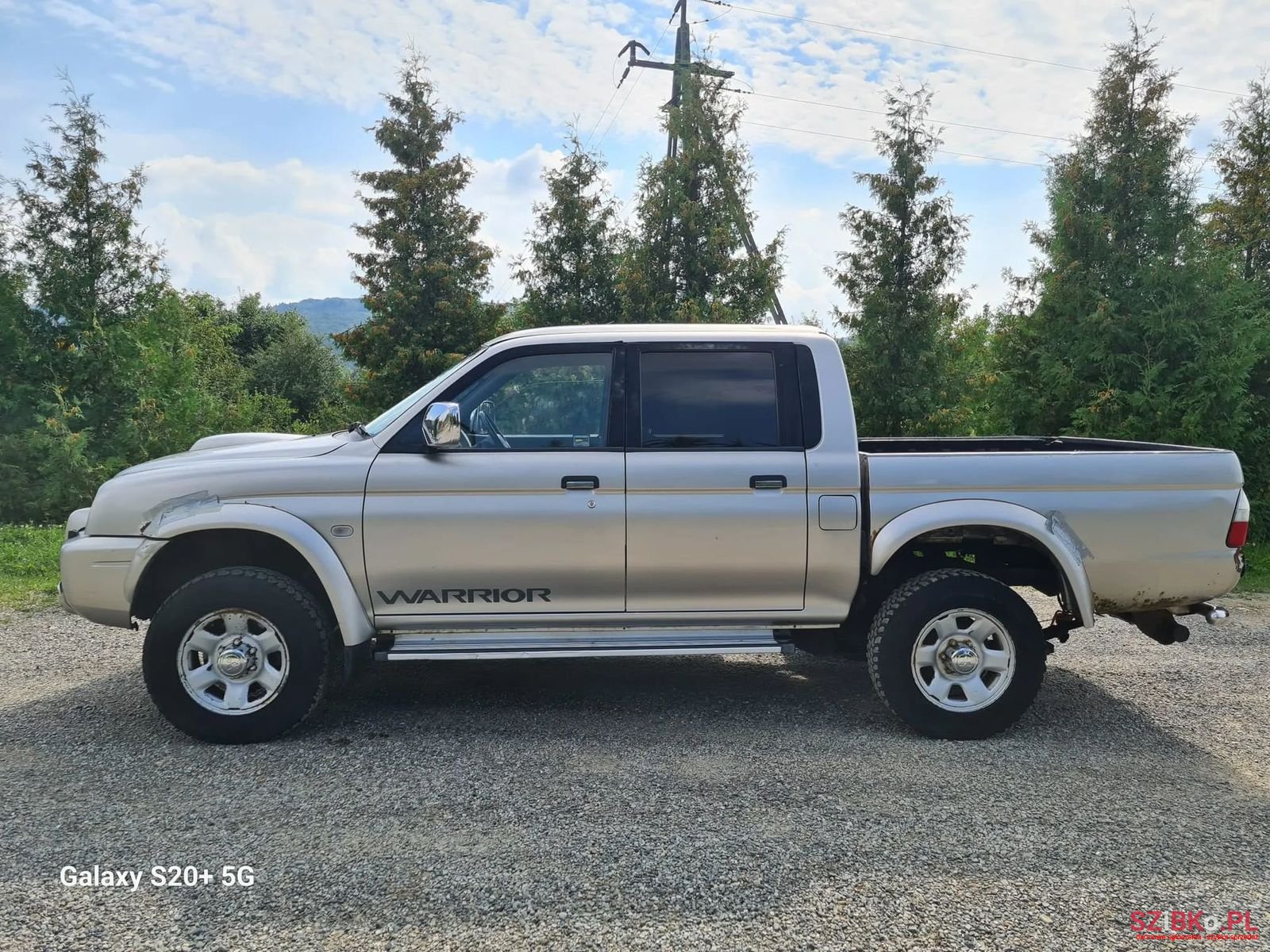 2004' Mitsubishi L200 photo #1