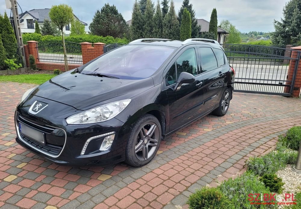 2012' Peugeot 308 photo #1