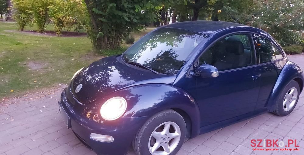 2003' Volkswagen New Beetle 1.4 photo #5