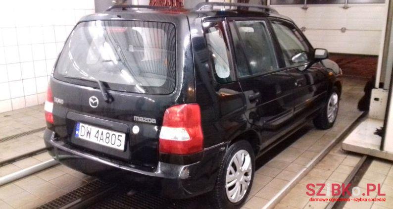 2002' Mazda Demio photo #1