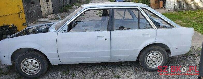 1984' Ford Escort photo #1