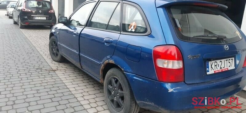 2001' Mazda 323 photo #1