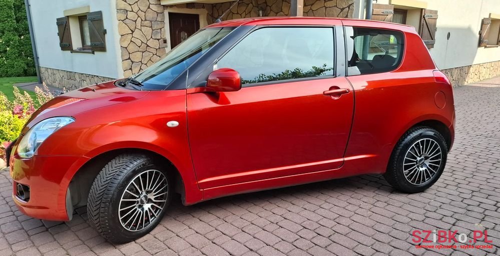 2009' Suzuki Swift photo #4