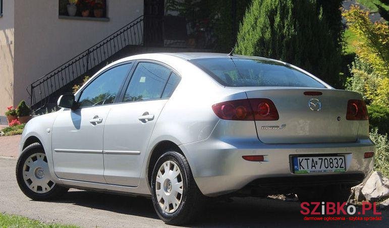2004' Mazda 3 photo #1