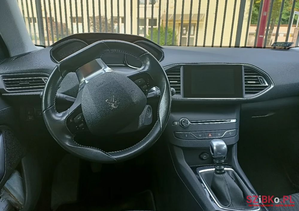 2014' Peugeot 308 Sw photo #1