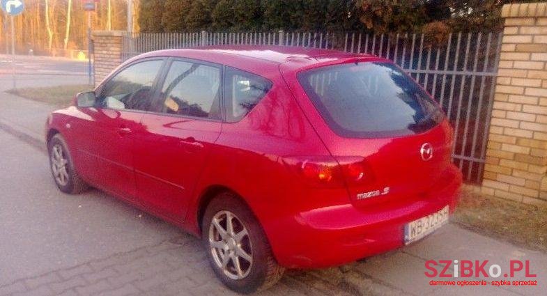 2004' Mazda 3 photo #1