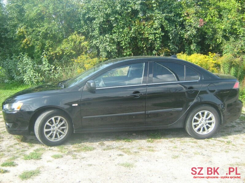 2013' Mitsubishi Lancer photo #3