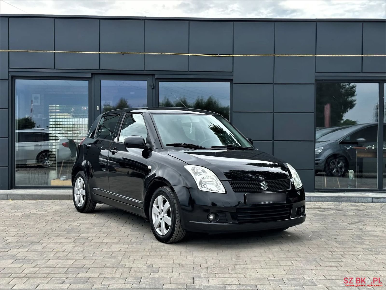 2009' Suzuki Swift photo #2