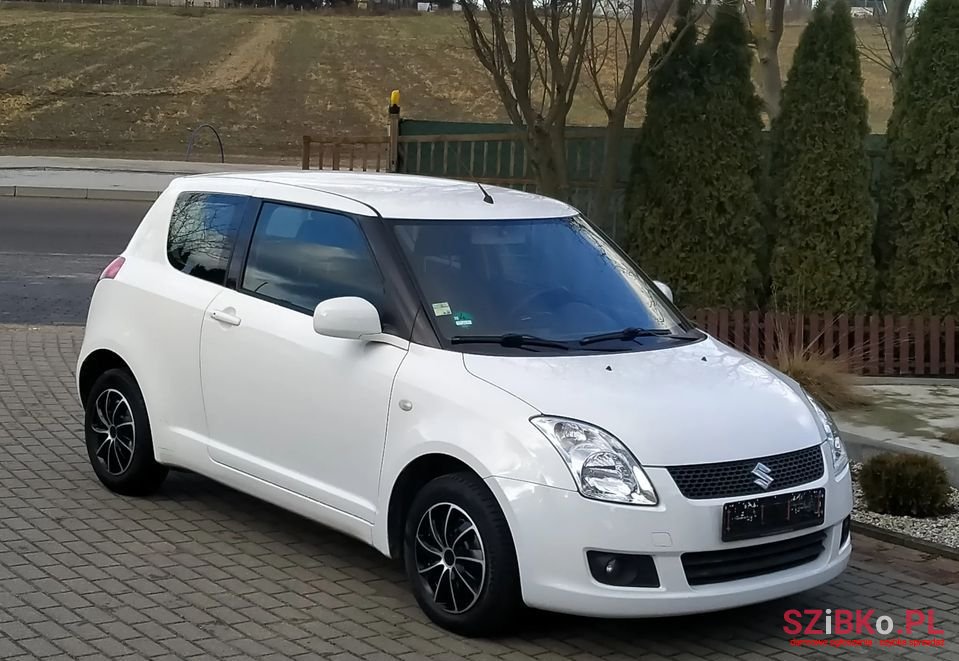 2009' Suzuki Swift photo #1