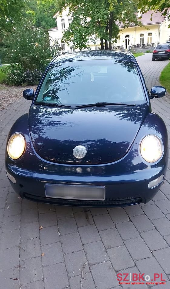 2003' Volkswagen New Beetle 1.4 photo #3