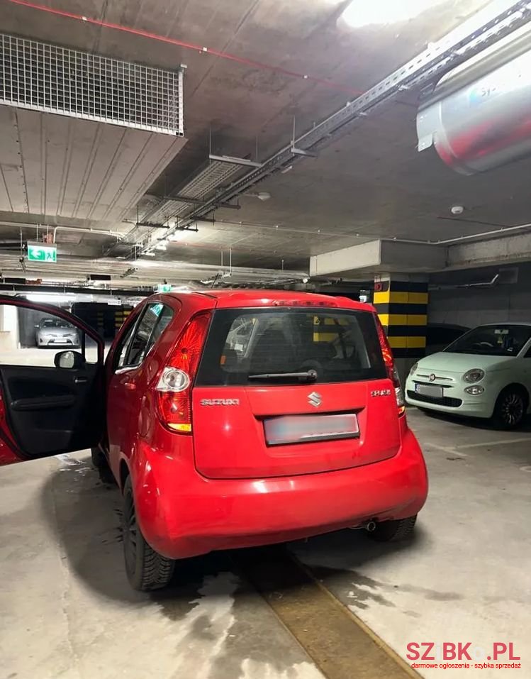 2009' Suzuki Splash 1.0 Basic photo #3