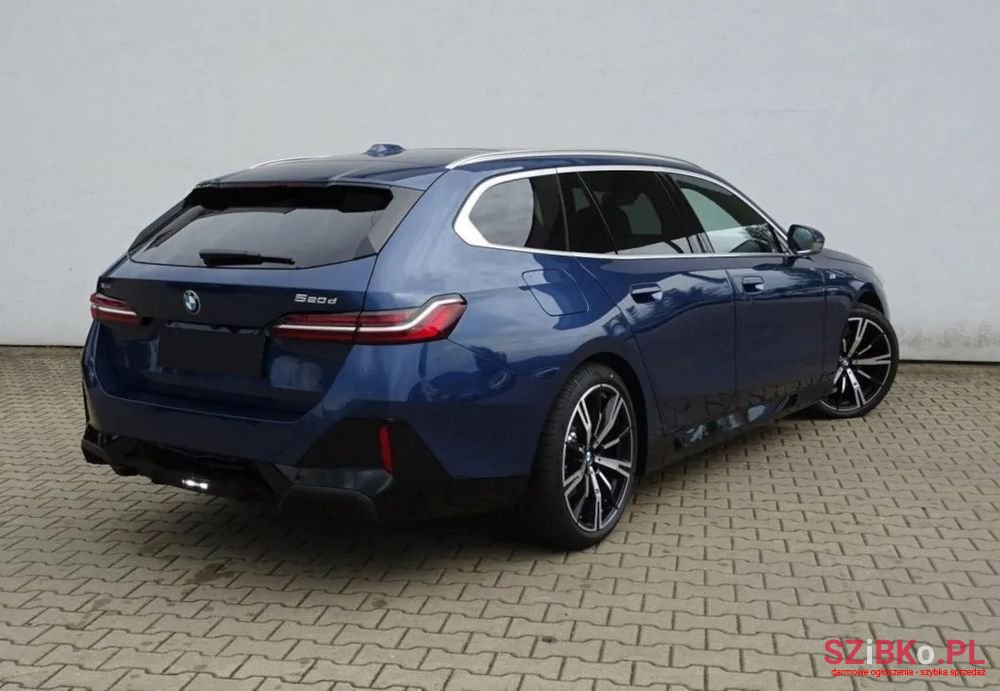 2024' BMW 5 Series 520D photo #1