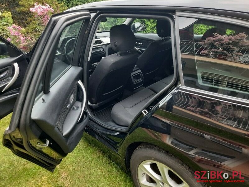 2014' BMW 318 photo #2