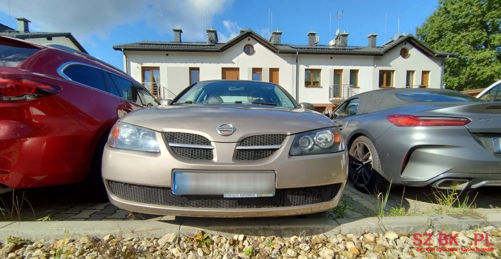 2006' Nissan Almera photo #1