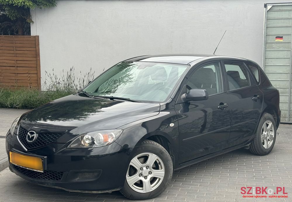 2009' Mazda 3 1.4 Sport Comfort photo #1
