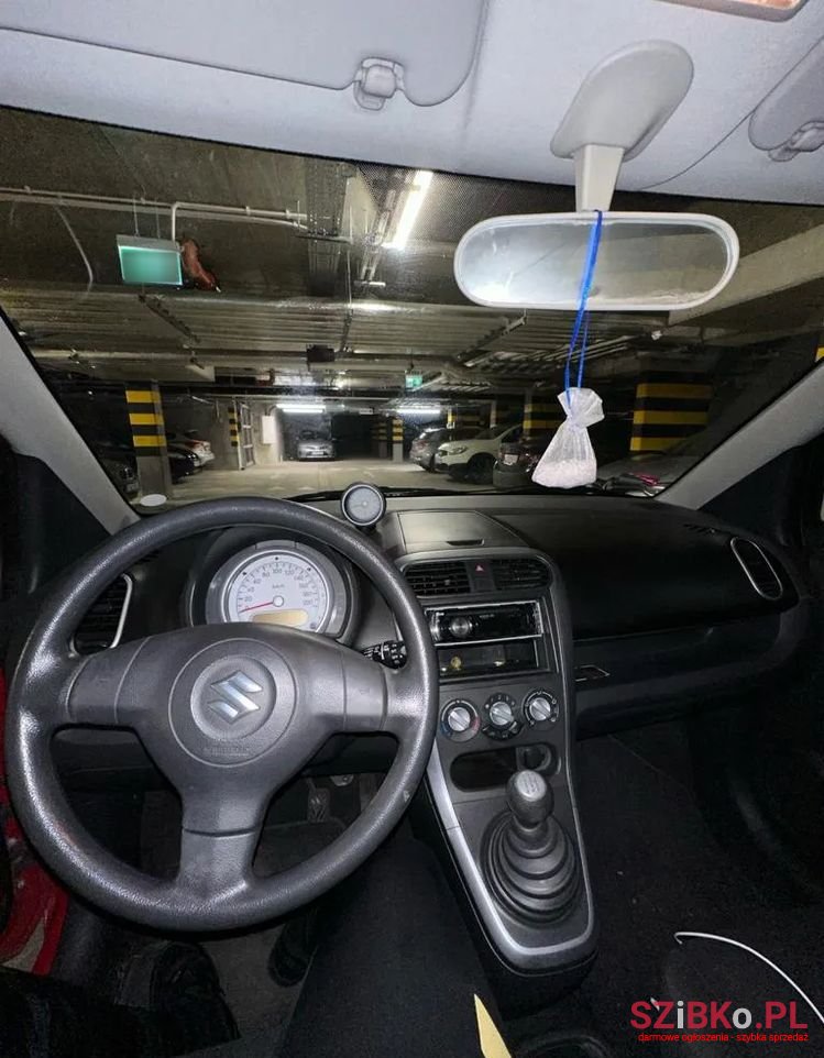 2009' Suzuki Splash 1.0 Basic photo #6