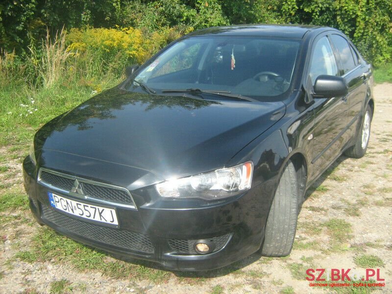 2013' Mitsubishi Lancer photo #1