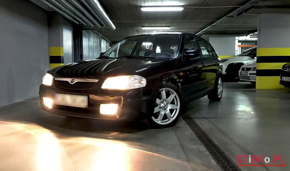 2000' Mazda 323 photo #1