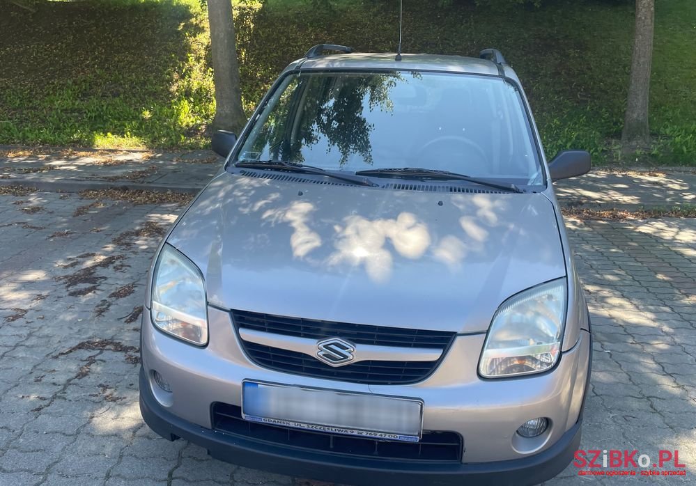 2004' Suzuki Ignis 1.3 Ddis Comfort photo #2