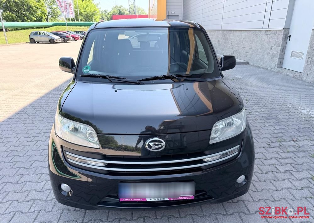 2010' Daihatsu Materia 1.3 photo #2