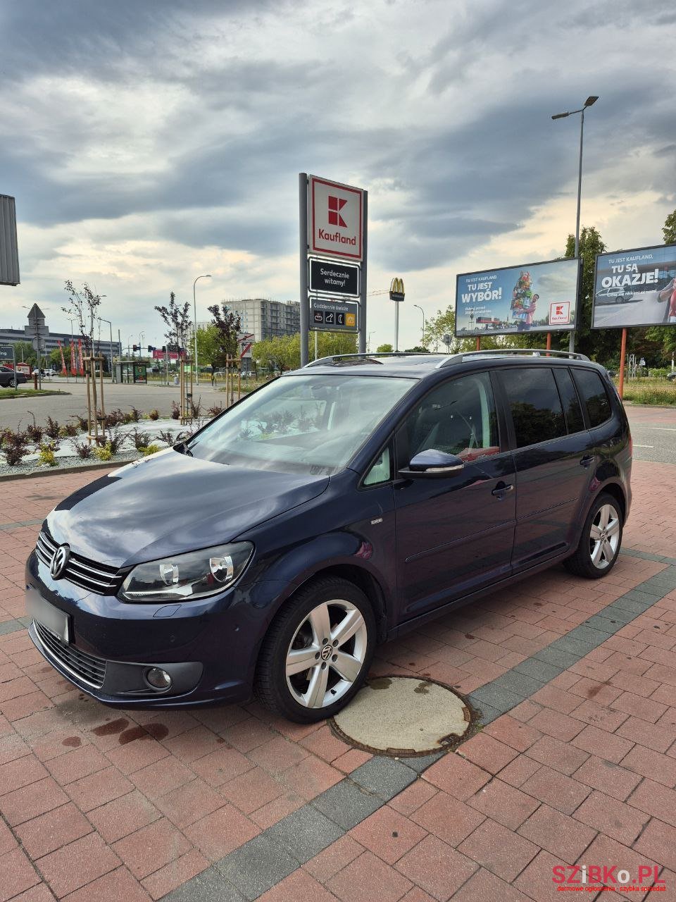 2014' Volkswagen Touran photo #1