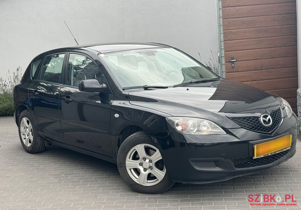 2009' Mazda 3 1.4 Sport Comfort photo #2