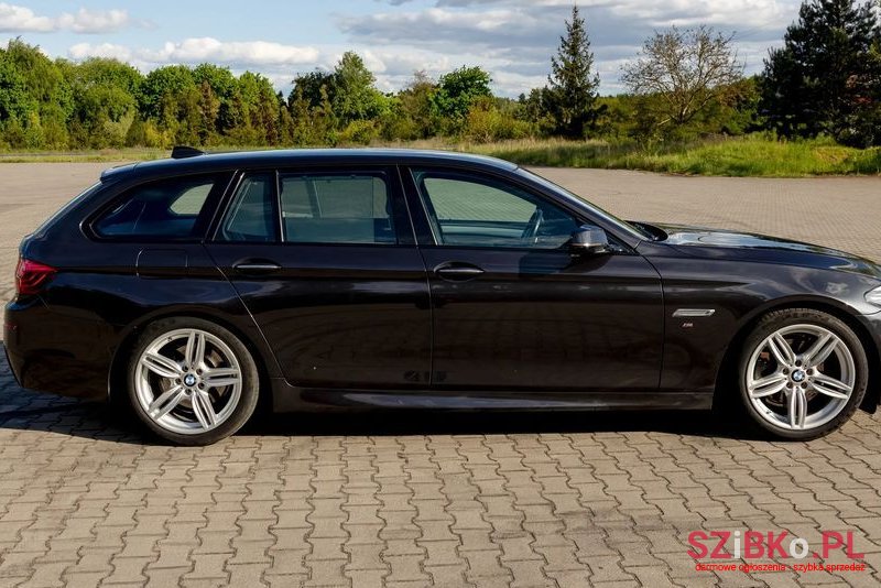 2014' BMW 5 Series 520D Touring Sport-Aut photo #5