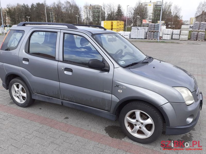 2005' Suzuki Ignis photo #1