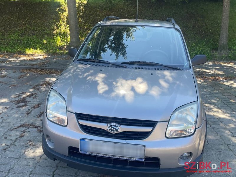 2004' Suzuki Ignis 1.3 Ddis Comfort photo #2