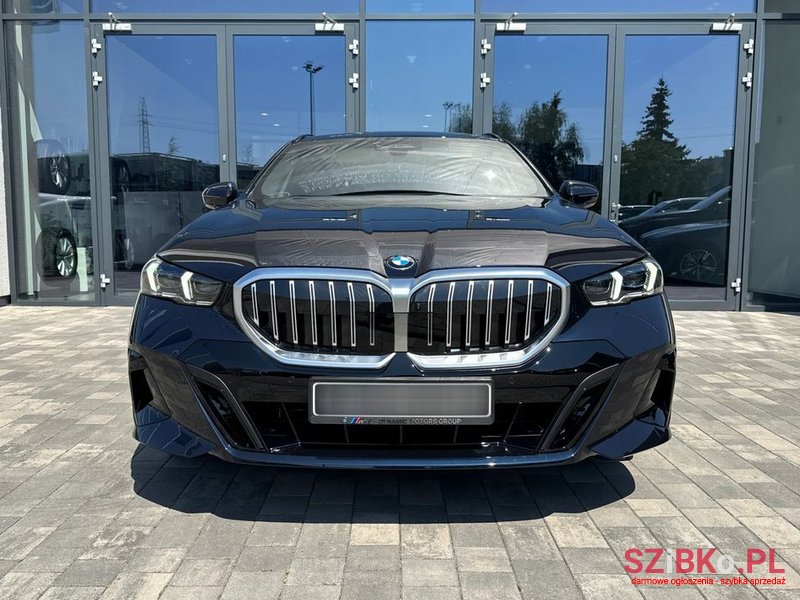 2024' BMW 5 Series 520D Xdrive Touring photo #1