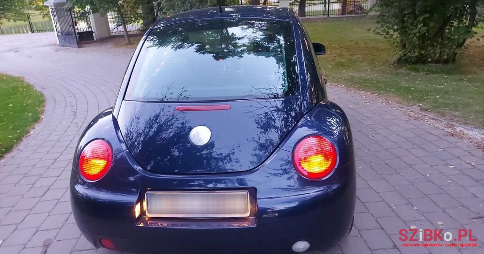 2003' Volkswagen New Beetle 1.4 photo #4