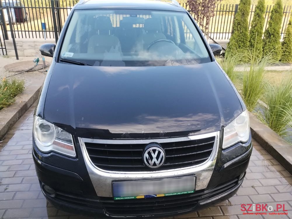 2008' Volkswagen Touran 1.4 Tsi Conceptline photo #1