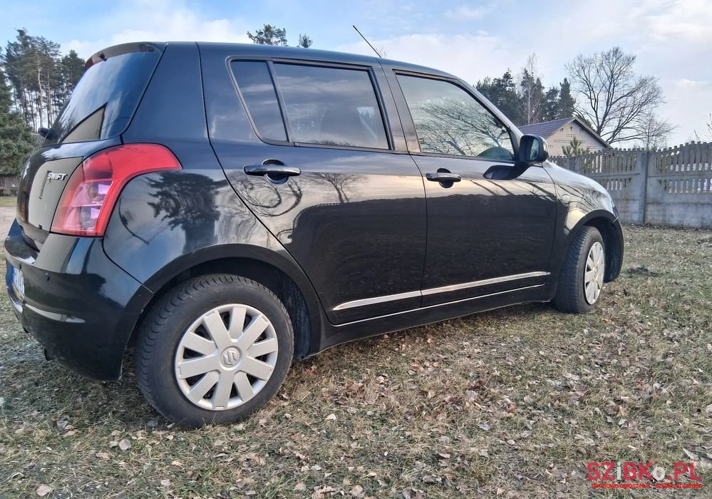 2009' Suzuki Swift photo #3