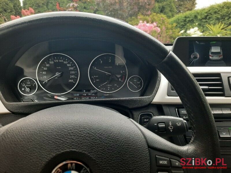 2014' BMW 318 photo #1