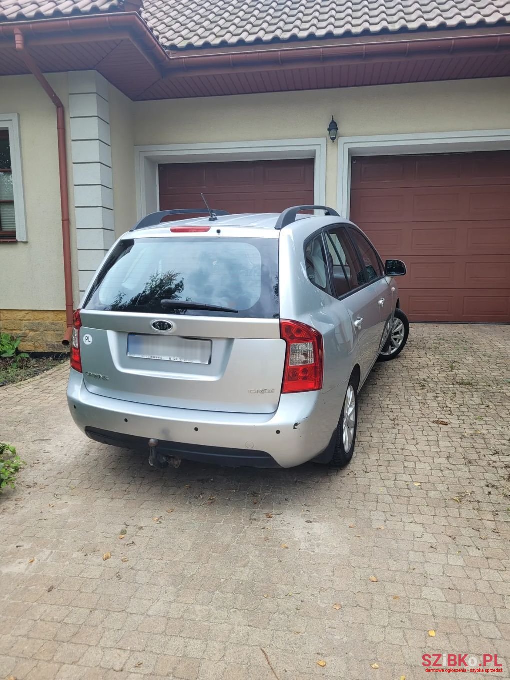 2009' Kia Carens photo #4