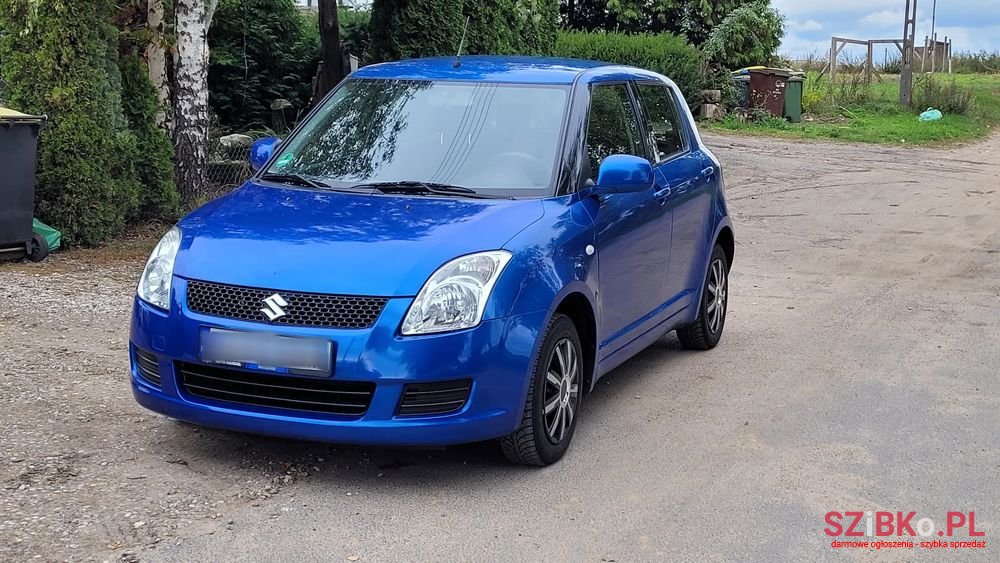 2009' Suzuki Swift 1.3 Comfort photo #1