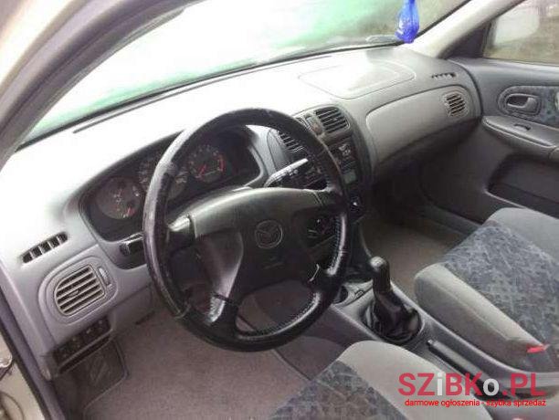 1999' Mazda 323 photo #3