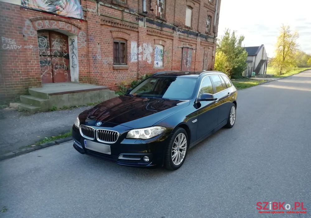 2015' BMW 5 Series 520D Touring photo #1