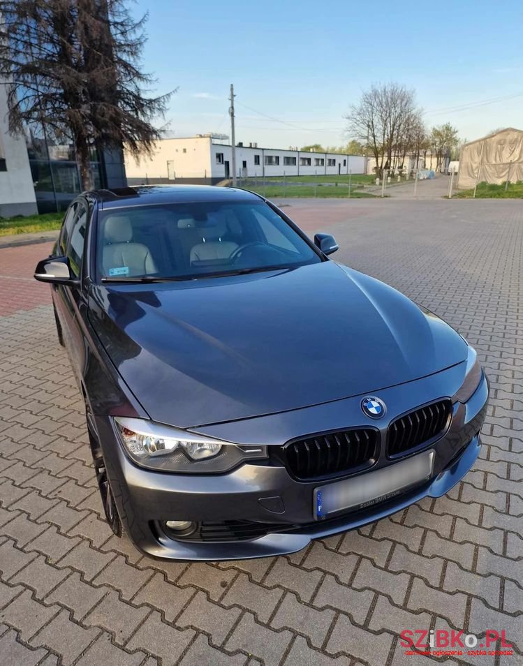 2012' BMW 3 Series 328I Touring photo #3