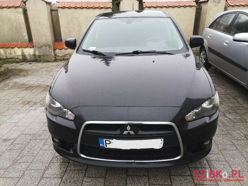 2012' Mitsubishi Lancer photo #2
