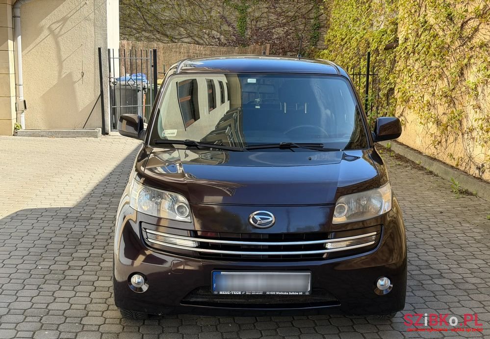 2007' Daihatsu Materia 1.5 photo #2